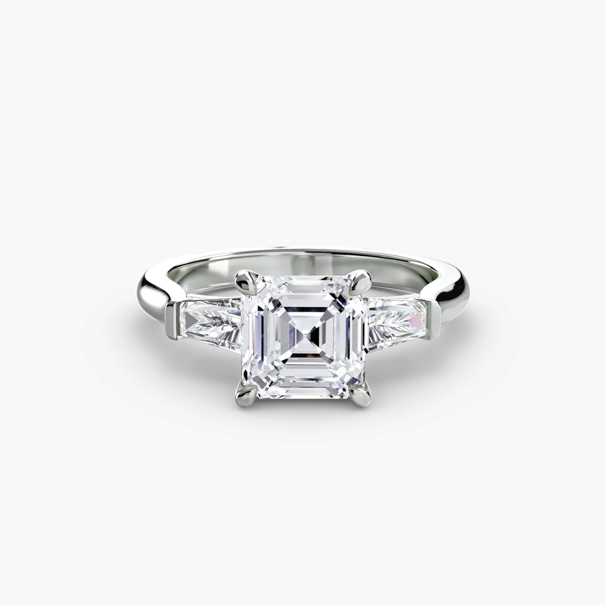 Anello trilogy con baguette laterali — montatura