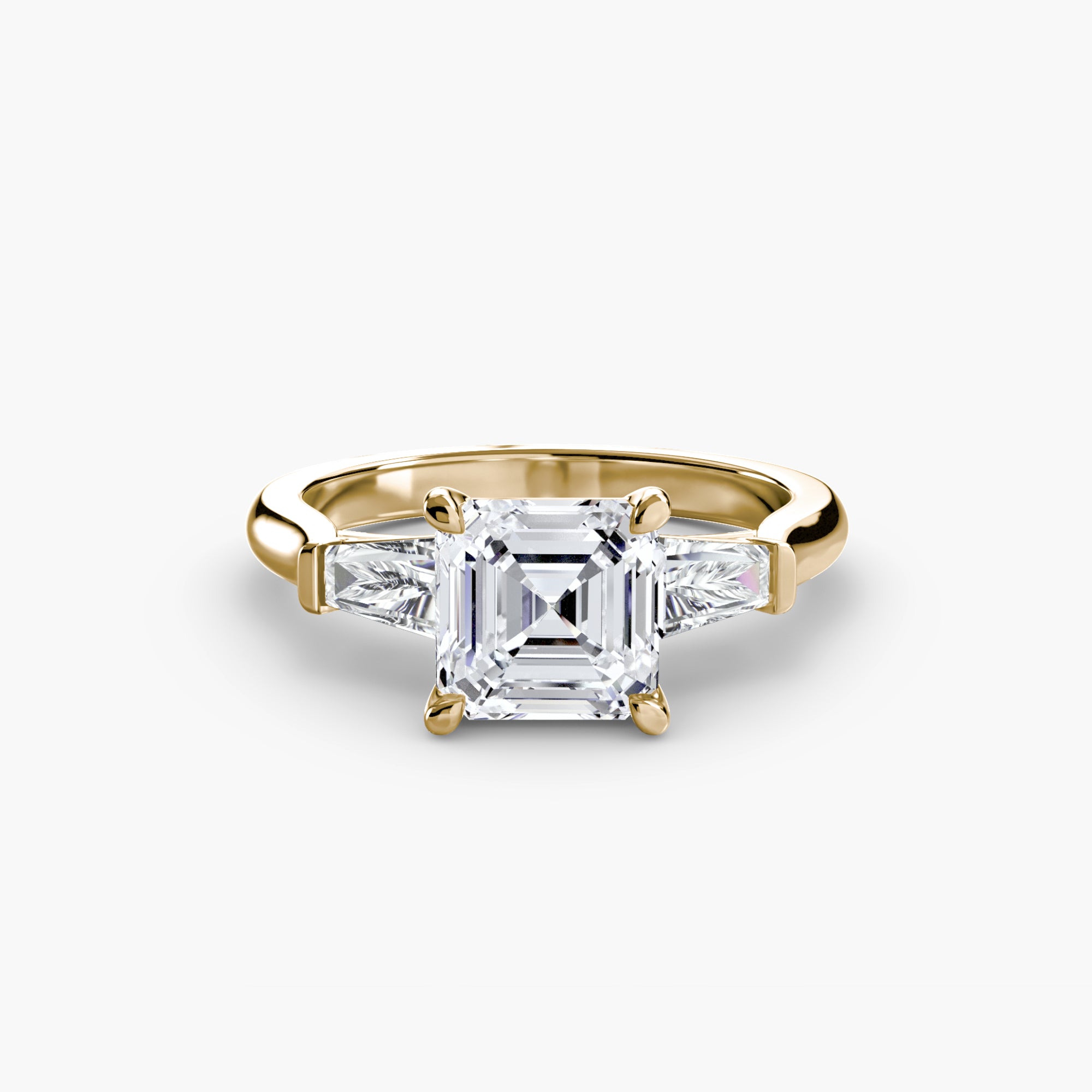 Anello trilogy con baguette laterali — montatura