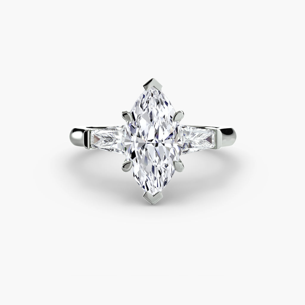 Anello trilogy con baguette laterali — montatura
