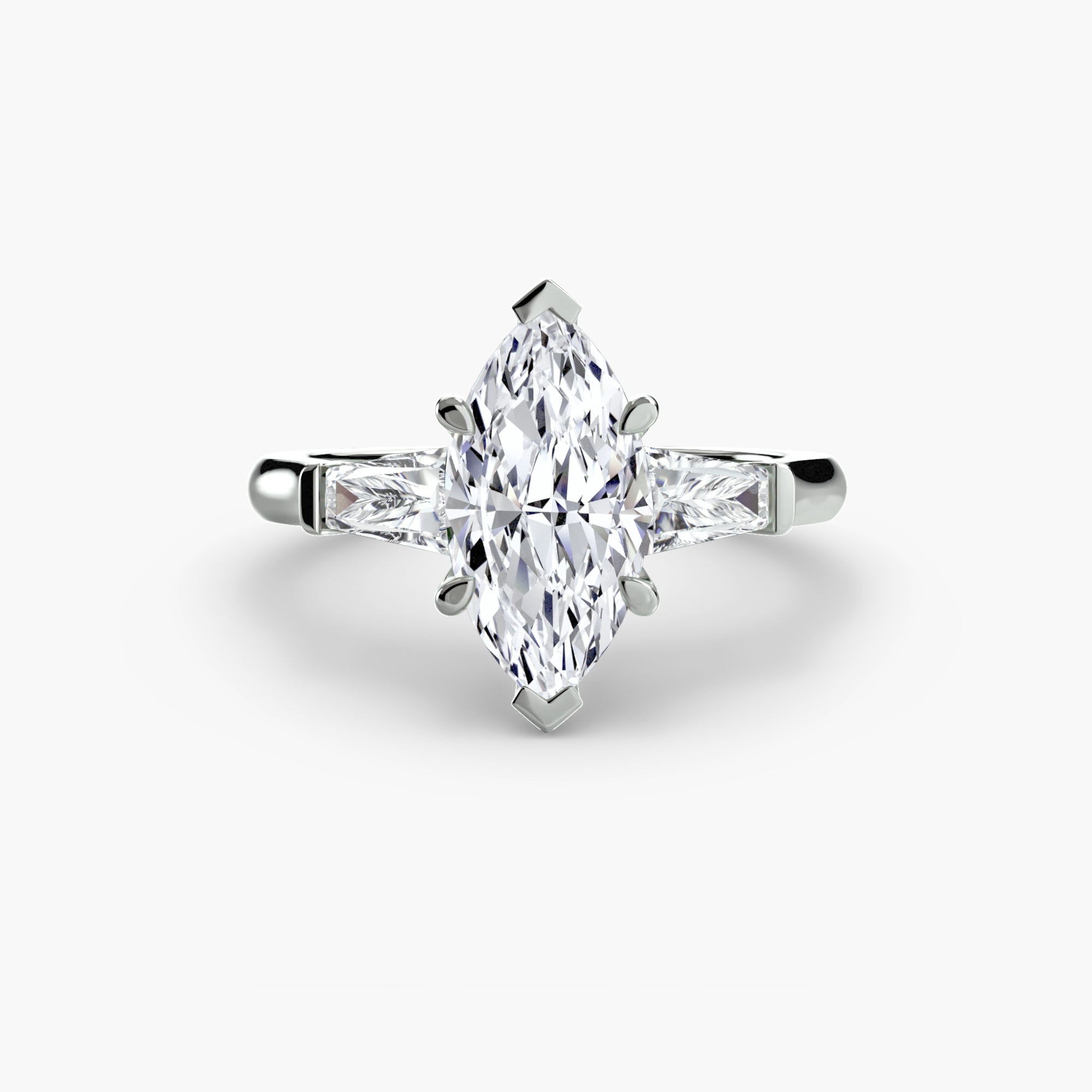 Anello trilogy con baguette laterali — montatura