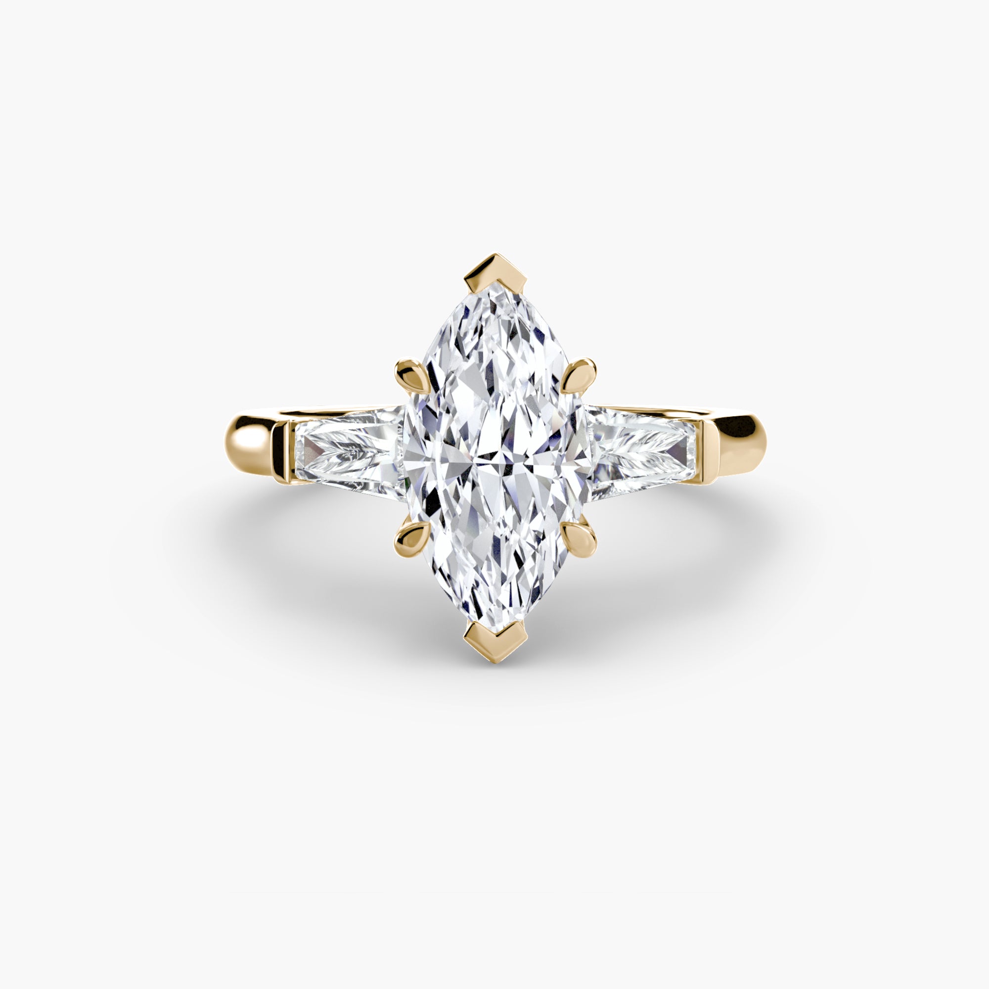 Anello trilogy con baguette laterali — montatura