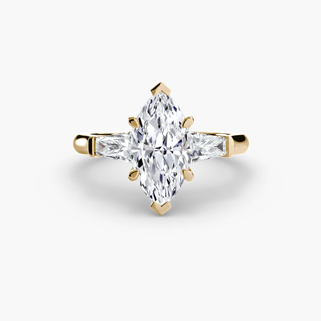 Anello trilogy con baguette laterali — montatura