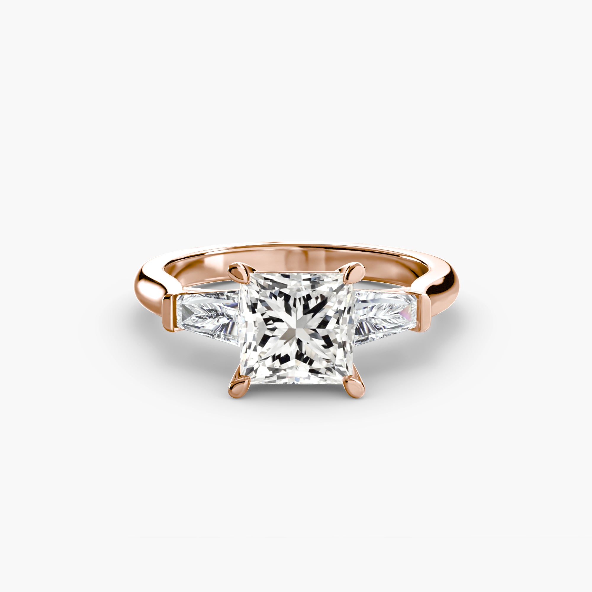Anello trilogy con baguette laterali — montatura