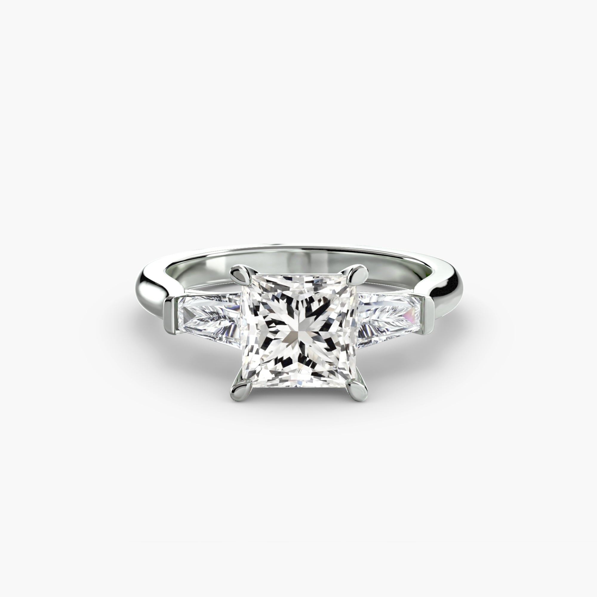 Anello trilogy con baguette laterali — montatura