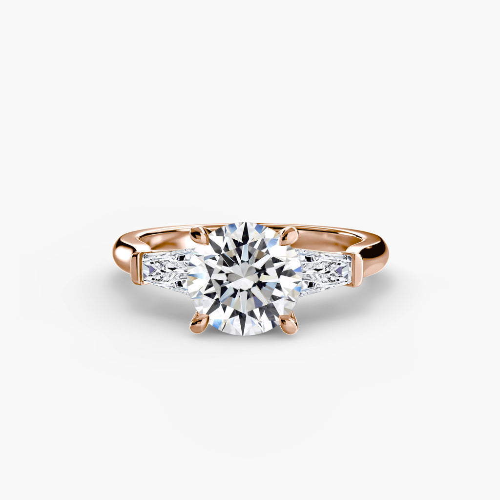 Anello trilogy con baguette laterali — montatura