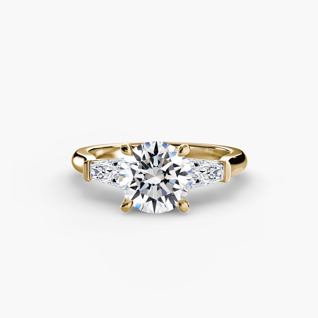 Anello trilogy con baguette laterali — montatura