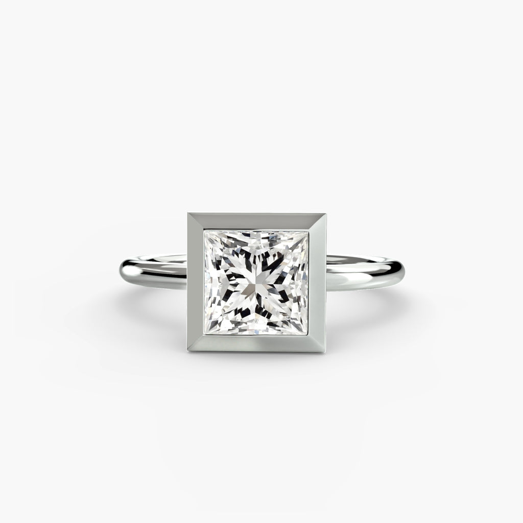 Anello solitario con castone bezel — montatura