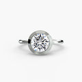 Anello solitario con castone bezel — montatura