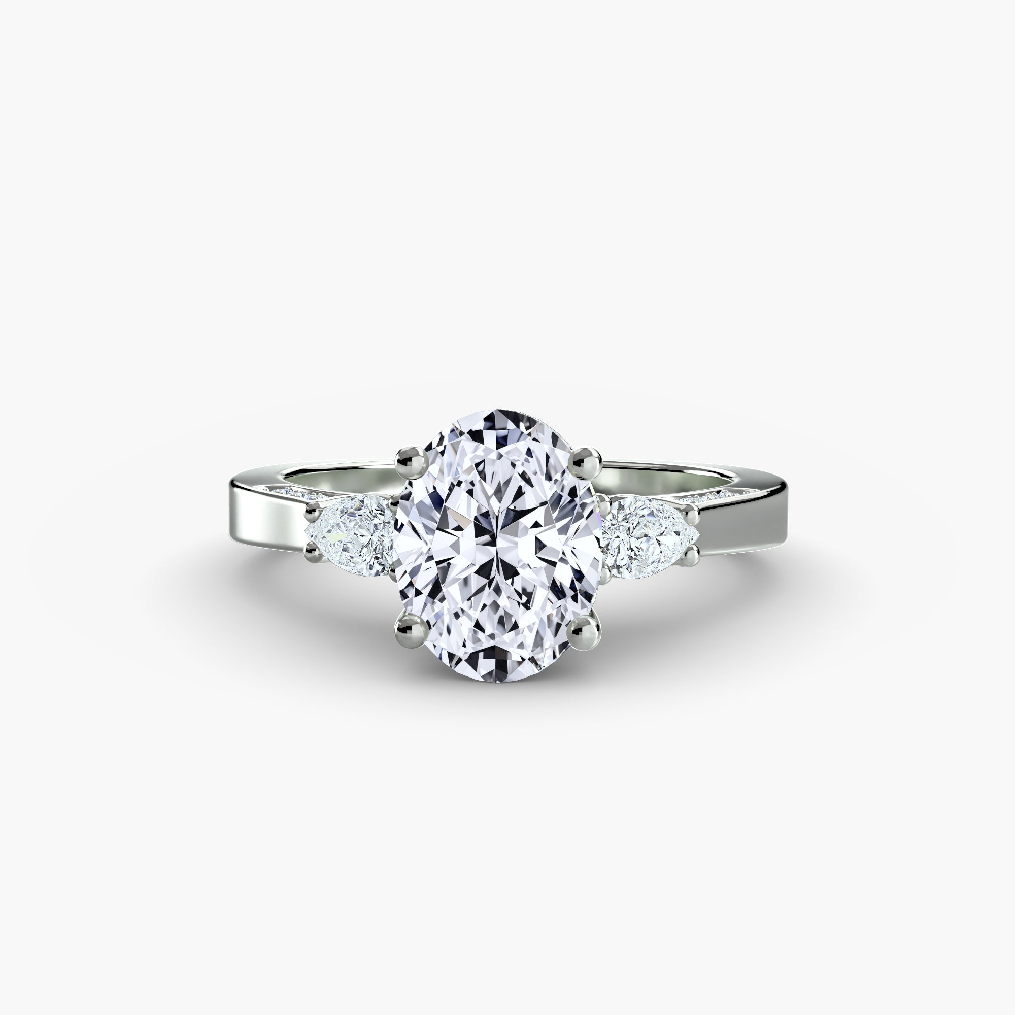 Anello trilogy con pavé sulle spalle — montatura